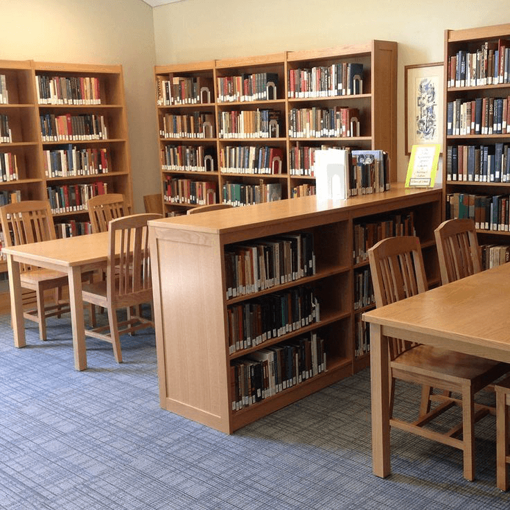 Students in a simple school library